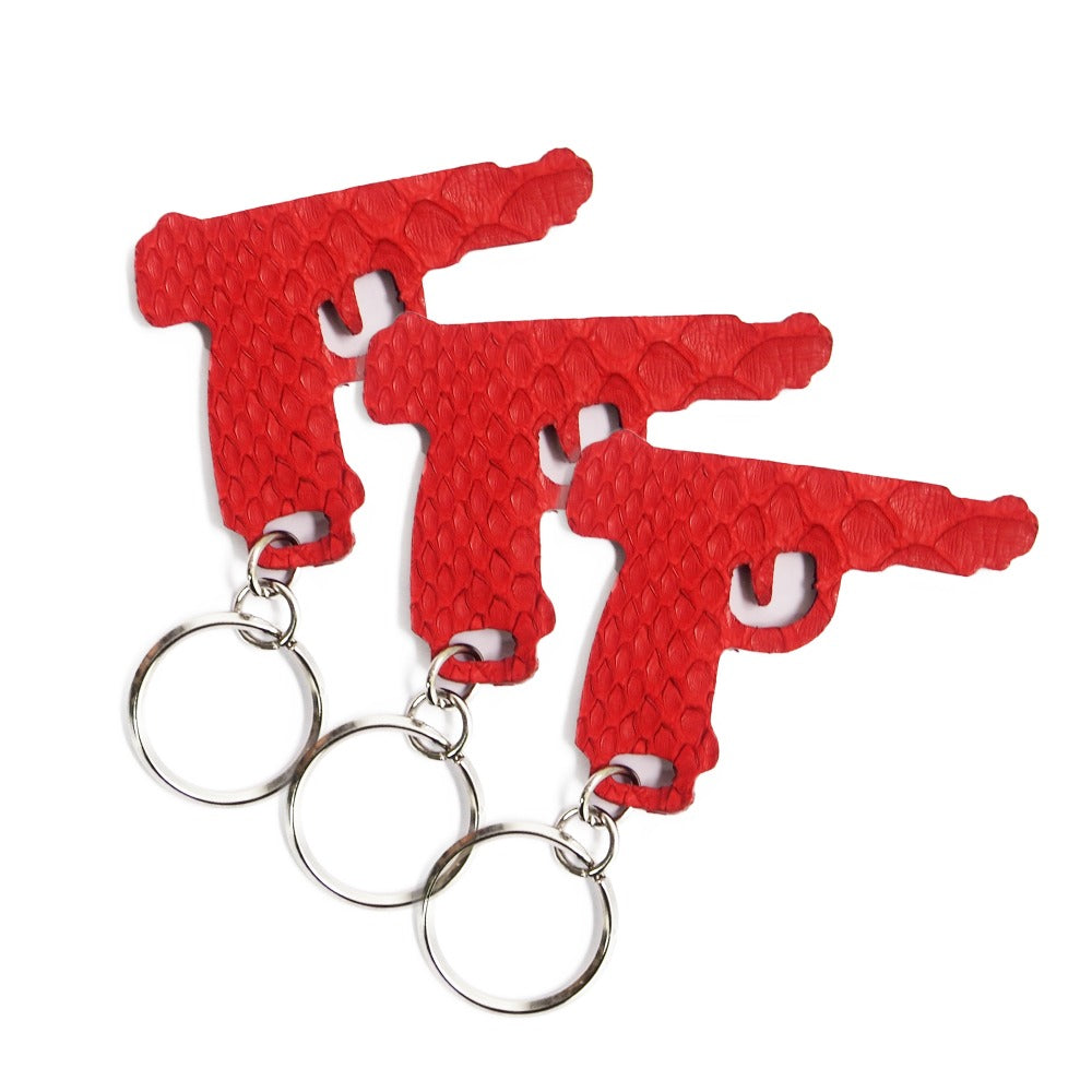 LLAVERO PITON ROJO PISTOLA