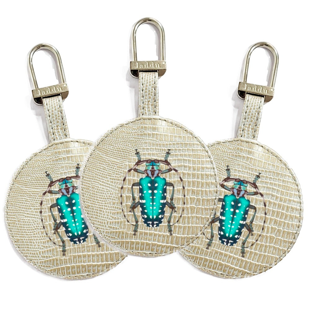 LLAVERO TEJUS PLATA BEIGE