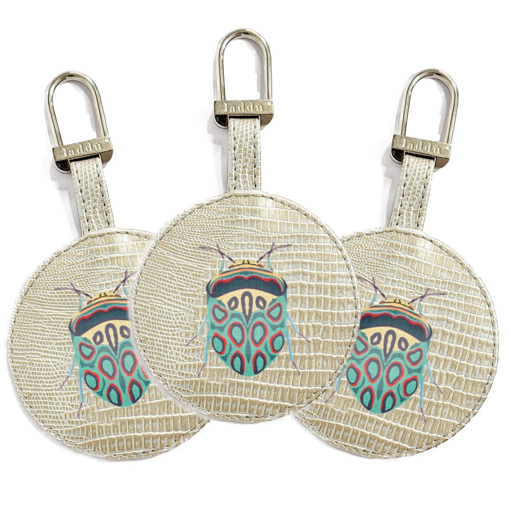 LLAVERO TEJUS PLATA BEIGE