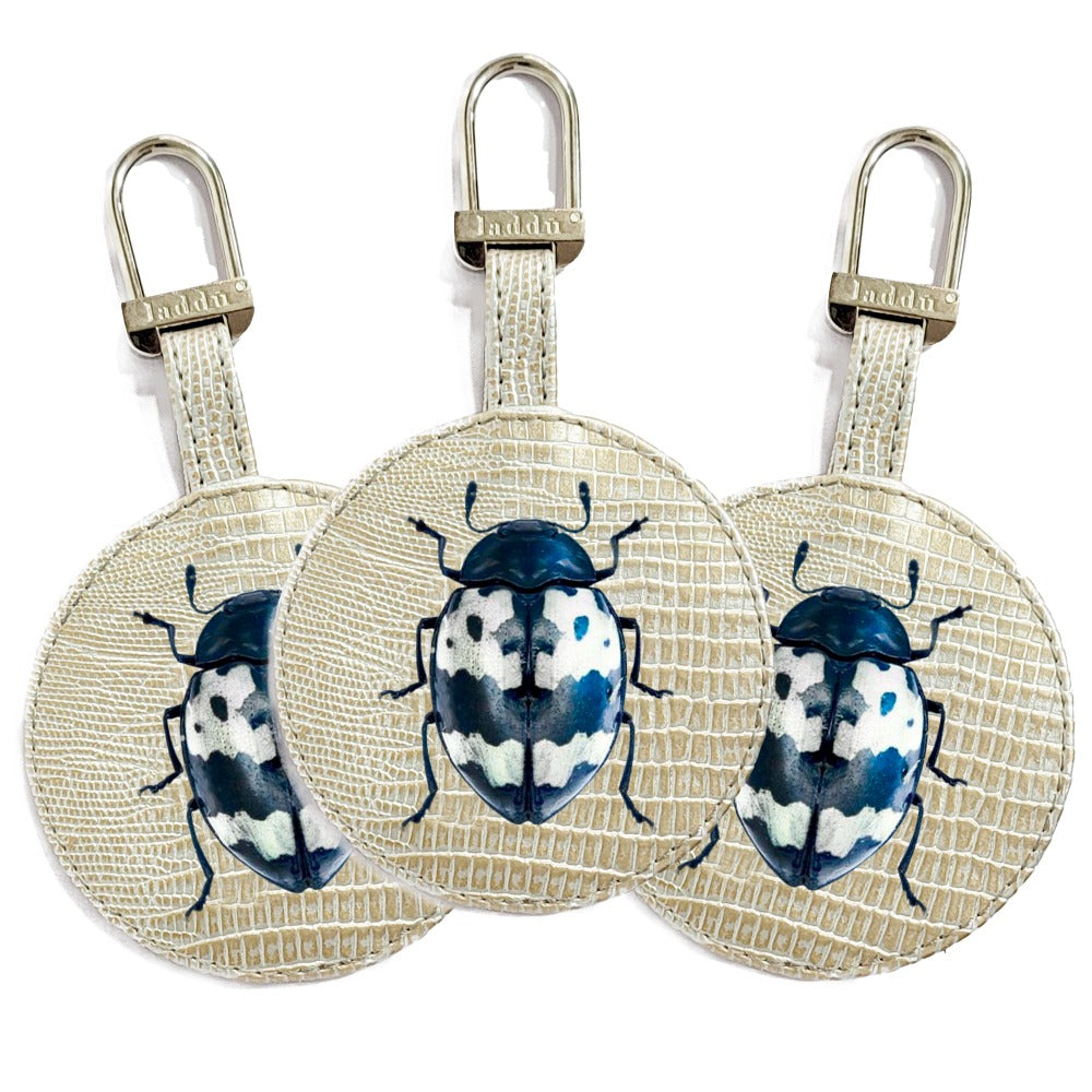 LLAVERO TEJUS PLATA BEIGE