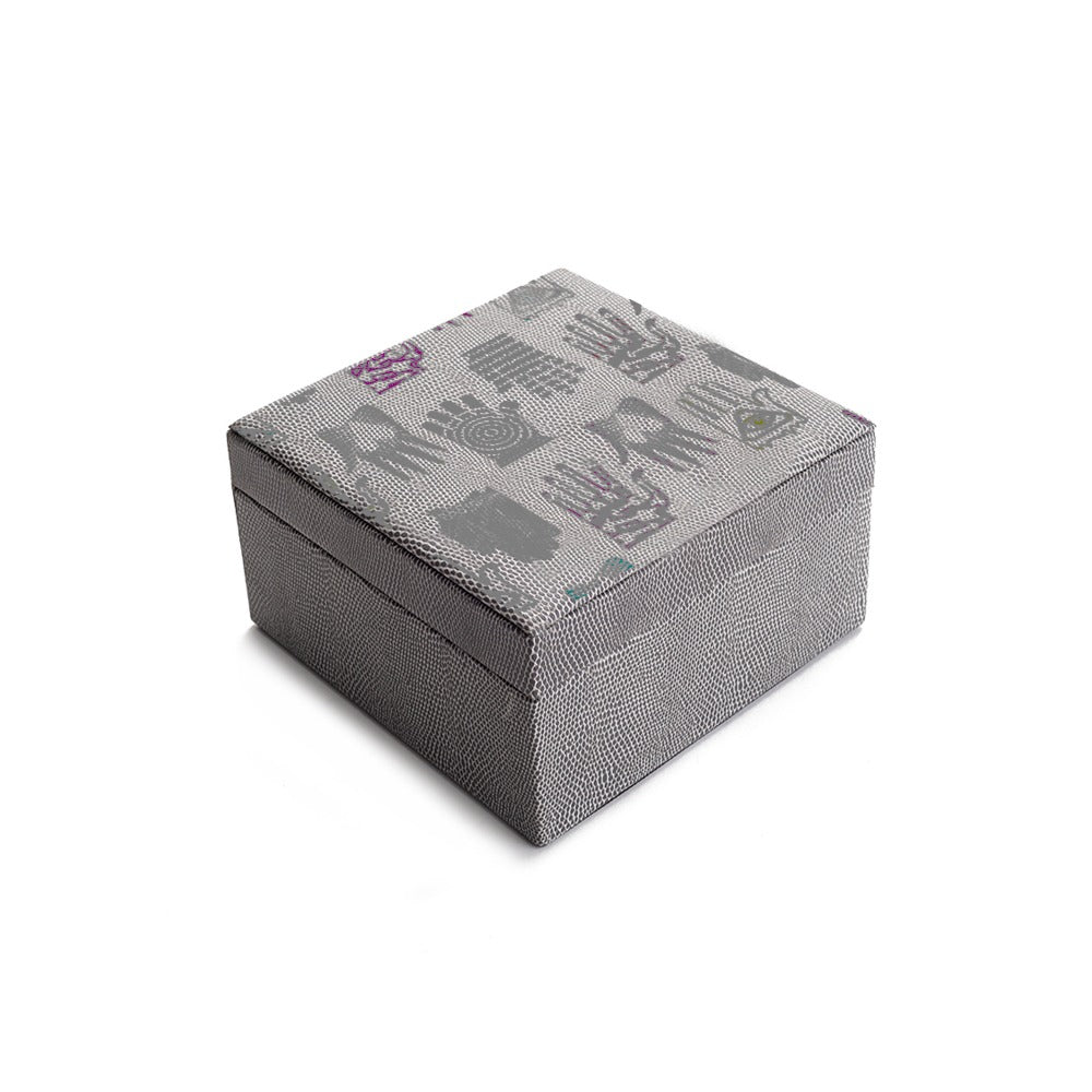 CAJA DE TE 4 REPTIL GRIS PEDRO FRIEDEBERG